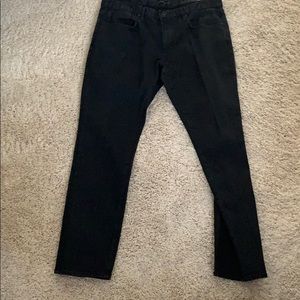 Men’s black jeans.